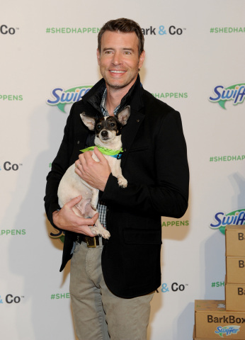 Scott Foley holds a rescue dog at Swiffer's "Welcome Home" event, Thursday, Nov. 12, 2015, in New York. Foley has partnered with Swiffer to spread the word that cleaning concerns should never be an obstacle to bringing home your child’s first pet. (Photo by Diane Bondareff/Invision for Swiffer/AP Images)