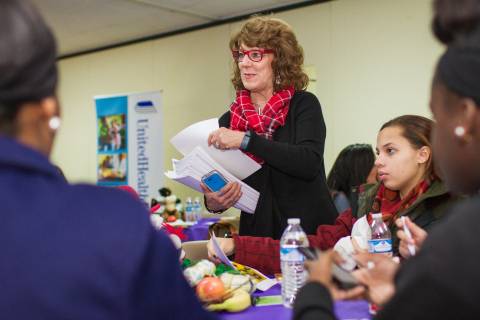 Cynthia Hudson with the Knox County Health Department hands out information to a group of teen moms and moms-to-be at the 15th annual Teaching Teens Outstanding Parenting Skills (T-TOPS) conference at the Central Baptist Bearden church in Knoxville, Tenn. UnitedHealthcare representatives gave a special lunchtime presentation on UnitedHealthcare’s Healthy First Steps case management program and Baby Blocks, an award-winning, free online wellness-incentive program. (Photo Credit: Bryan Allen)