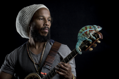 Ziggy Marley with a Panther Chameleon - Photo Credit: Robin Moore, Global Wildlife Conservation