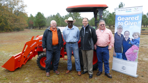 Left to right: Charlie McCullen, Cumberland Tractor Company; Marvin Frink; Alex Woods, Kubota vice president divisional operations; Michael O’Gorman, FVC executive director. (Photo: Business Wire)

