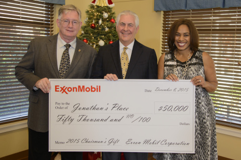 Exxon Mobil Corporation Chairman and Chief Executive Officer Rex W. Tillerson presents the company's annual chairman's gift of $50,000 to Jonathan's Place, kicking off the organization's 25th anniversary on Tuesday, Dec. 8, 2015, in Garland, Texas. Pictured left to right: Garland Mayor Douglas Athas, Rex W. Tillerson, and Allicia Frye, chief executive officer of Jonathan's Place. (Photo: Business Wire)