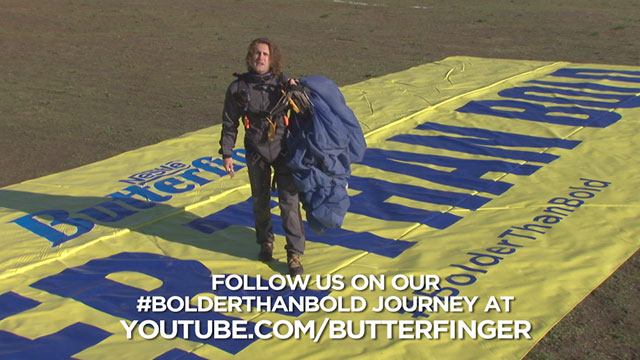 Nestlé Butterfinger announced its February 7th Big Game commercial with the launch of its new #BolderThanBold campaign from 12,000 feet above the ground on December 15, 2015.