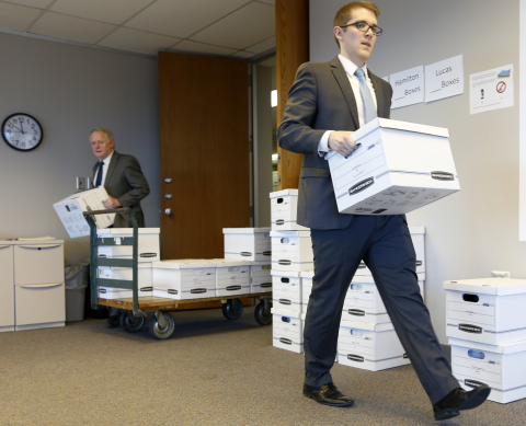 Donald J. McTigue and Derek Klinger from McTigue, McGinnis & Colombo law firm submit 171,205 voter signatures in support of the Ohio Drug Price Relief Act to the Secretary of State's office on December 22. (Photo: Business Wire)