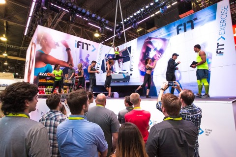 At CES 2016, entertainers at the iFit booth demonstrate the benefits of iFit Coach®, the first fitness solution to provide a daily game plan of personalized, expert recommendations for the four pillars of health: exercise, activity, nutrition and sleep. (Photo: Business Wire)