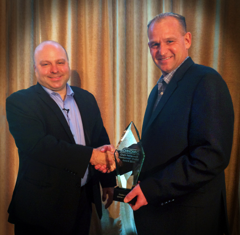 Nick Flanagan, a senior vice president for restaurant and retail for Cracker Barrel Old Country Stores®, accepts award from Technomic President Darren Tristano. Cracker Barrel was named a Chain Restaurants Consumers' Choice Award winner for 2016. (Photo: Business Wire)