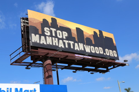 'Stop Manhattanwood,' a new advocacy and awareness billboard campaign backed by AHF that exposes the downside of overdevelopment in Los Angeles launched earlier this week. (Photo: Business Wire)