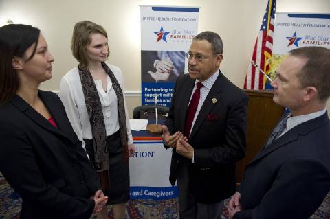 Congressman Sanford Bishop, Jr. (GA-2) talks to military caregivers during a Capitol Hill forum that highlighted unique military caregiver challenges. During the forum a new initiative was announced by United Health Foundation and Blue Star Families to train and support military caregivers. L to R: Sherrie Wilcox, Ph.D., CHES, caregiver and senior research advisor at BSF; Marine spouse and caregiver Callie Barr, BSF Operation Family Caregiver Program; Congressman Bishop; and Tom Wiffler, chief operating officer of UnitedHealthcare Military & Veterans (Photo: Barbara Salisbury).