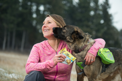 Kristina Guerrero is on a hike with adopted dog Odin in Shelburne, Vt. Guerrero created TurboPUP, an all-natural, complete meal-on-the-go bar for dogs. She and her portable meal bar were recently featured on ABC's Shark Tank. PetSmart will carry the innovative product with initial exclusivity in more than 900 stores in the U.S. and Canada through March. (Photo: Business Wire)