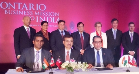 The Honorable Kathleen Wynne, Premier of Ontario, is seen standing third from right. Mr. Bhupendra Bhate, Chief Delivery Officer of Industrial Products, Process Industry, Medical, Mechanical & Embedded Horizontals at L&T Technology Services is seated (Centre) along with Mr Hari Subramaniam, CEO, eCamion Inc to his right and Mr Mohamed Lachemi, Interim President, Ryerson University.(Photo: Business Wire) 