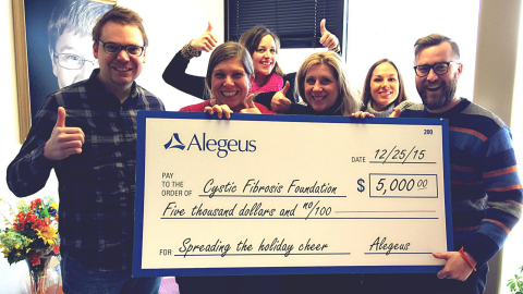 Alegeus employee Matt Fiel (left), with representatives from the Cystic Fibrosis Foundation. (Photo: Business Wire)