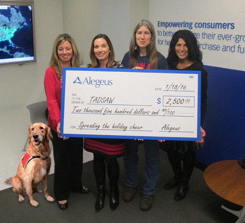 Alegeus employees Jennifer Robitaille, Jen Gallego and Dina Spylios with TADSAW trainer Sherrie King. (Photo: Business Wire)