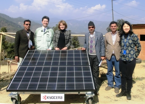 Kyocera employee delivering solar power generating systems to Sindhupalchowk District in Nepal to support earthquake reconstruction (Photo: Business Wire)