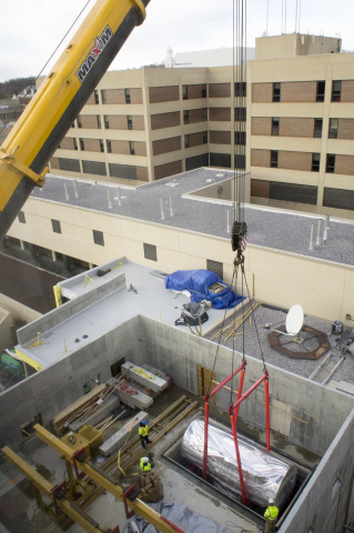 A MEVION S250 proton accelerator is lowered through a hatch and into position inside MedStar Georgetown University Hospital on Saturday, February 13. (Photo: Business Wire)