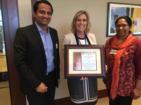 Karla Wallace, Director – Central Engineering, UTC Aerospace Systems, holds the Productivity Award with Abhijith Srinivas, Account Director, L&T Technology Services and Susan Wilson Group Head Delivery, Platinum Account, at L&T Technology Services. (Photo: Business Wire)