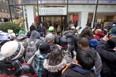 In this photo provided by Nintendo of America, Nintendo fans eagerly await the grand reopening of the remodeled Nintendo NY store in Rockefeller Plaza on Feb. 19, 2016.