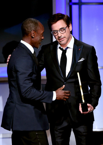 Robert Downey Jr. presents friend, Don Cheadle, with the ABFF Award for Excellence in the Arts (male) (Photo: Business Wire)