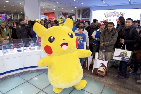 In this photo provided by Nintendo of America, fans meet and take photos with the costumed Pikachu character at the Pokémon 20th Anniversary Fan Celebration at Nintendo NY on Feb. 27, 2016. (Photo: Business Wire)