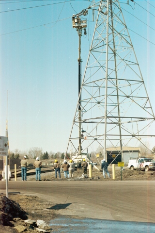 3M™ Aluminum Conductor Composite Reinforced (ACCR) is installed in the first field test of a composite conductor in the United States on March 27, 2001, at Xcel Energy’s Riverside Plant in Minneapolis. Photo courtesy of 3M