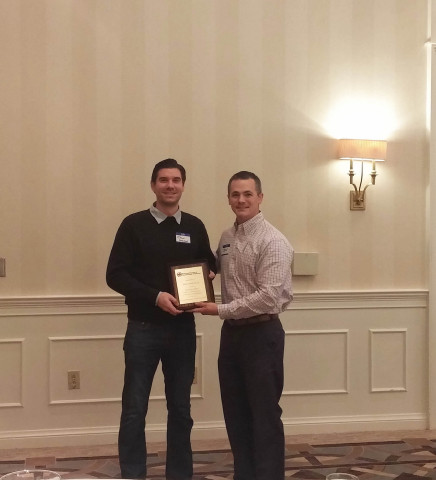 SCSPE member Jason Vaughn presenting the Young Engineer of the Year Award to Shawn Goddeyne (Photo: Business Wire)