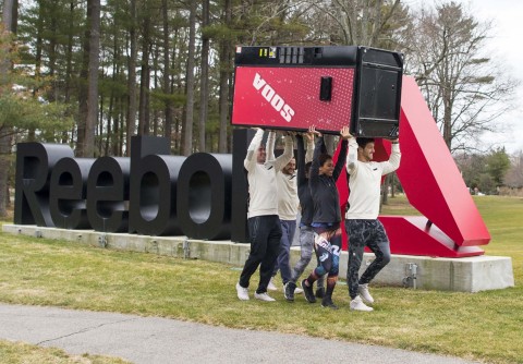 Reebok staff celebrate saying 'See Ya Soda,' at the fitness brand's global HQ in Canton, Mass on March 10.