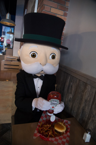 MR. MONOPOLY and MONOPOLY money go together like Heinz ketchup and fries. The real estate titan enjoys his birthday meal and celebrates the MONOPOLY EMPIRE game on World MONOPOLY Day, March 19, 2016. (Photo: Business Wire)
