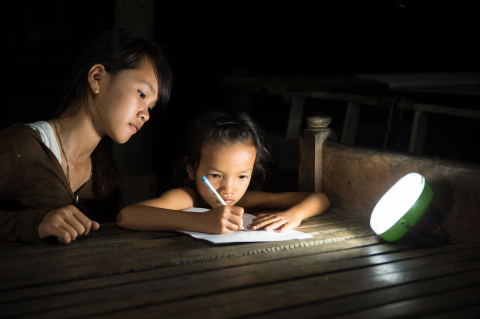 Panasonic's solar lanterns being used in evening classes in villages without electricity in Cambodia ... 