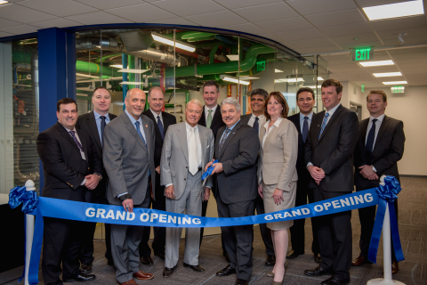 The Watts Water Learning Center officially opened with a ribbon-cutting ceremony. From left, Watts Water Technologies executives Tim O'Neil, SVP and Director of Operations; Chris Jamieson, VP Marketing; Peter Parsons, Training Manager; TJ Pearce, VP Finance; Timothy P. Horne, Director Emeritus; Todd Trapp, CFO; Bob Pagano, CEO; Munish Nanda, President, Americas and Europe; Debra Ogston, CHRO; Roberto Vengoechea, Backflow and Valves Platform Leader; Andrew Windsor, VP Sales – Americas; and Per Thanning Johansen, Global Drains Platform Leader. (Photo: Business Wire)