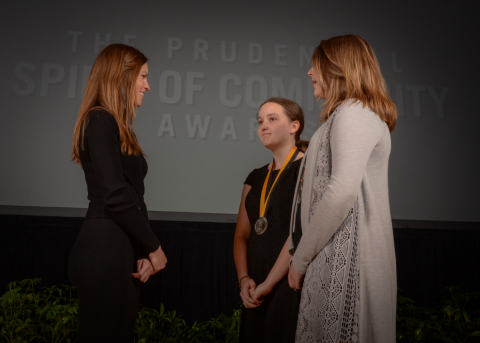 Academy Award-winning actress Hilary Swank congratulates Maria Keller, 15, of Plymouth (center) and Jasmine Kennebeck, 13, of Reads Landing (right) on being named Minnesota's top two youth volunteers for 2016 by The Prudential Spirit of Community Awards. Maria and Jasmine were honored at a ceremony on Sunday, May 1 at the Smithsonian's National Museum of Natural History, where they each received a $1,000 award. (Photo: Zach Harrison Photography)