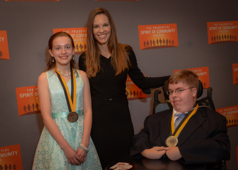 Academy Award-winning actress Hilary Swank congratulates Parker Inks, 17, of Fremont (right) and Meagan Warren, 12, of Bexley (left) on being named Ohio's top two youth volunteers for 2016 by The Prudential Spirit of Community Awards. Parker and Meagan were honored at a ceremony on Sunday, May 1 at the Smithsonian's National Museum of Natural History, where they each received a $1,000 award. (Photo: Zach Harrison Photography)