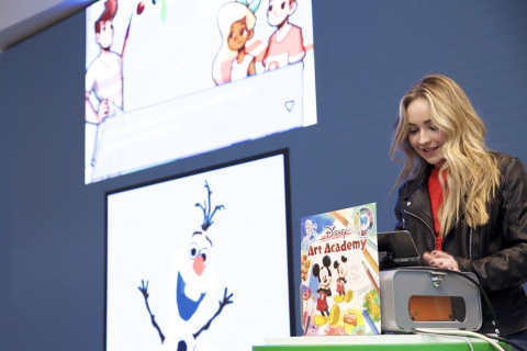 In this photo released by Nintendo of America, people of different skill levels follow step-by-step instructions in the Disney Art Academy video game for the Nintendo 3DS family of systems. By participating in fun lessons and Free Paint, anyone can learn to draw more than 80 Disney and Pixar characters, like Mickey Mouse, or Elsa and Olaf from Disney Frozen.