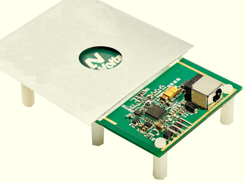 NU1000 High Frequency Wireless Power Transmitter Charging Through Metal Case (Photo: NuVolta Technologies Inc.)