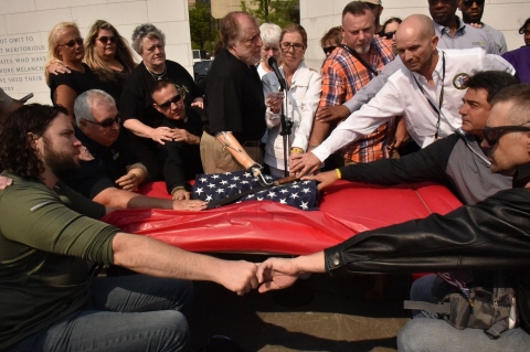 Dozens of ill and injured veterans take the Spartan Pledge, an oath against suicide, at The American Veterans Disabled for Life Memorial in Washington, D.C., on May 8. Photo Credit: DAV (Disabled American Veterans)