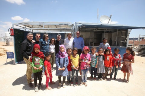 SES And SOLARKIOSK Bring Power and Internet to an Education Centre in a Jordanian Refugee Camp (Photo: Business Wire)