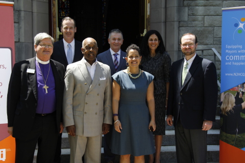New Jersey public officials, community leaders and health care leaders gathered at Trinity Episcopal Cathedral in Trenton Friday, May 20, to announce United Health Foundation has awarded a $550,000 grant to the New Jersey Health Care Quality Institute to support its "Healthy Communities create Healthy Citizens" project. The grant will enable NJHCQI and their partner organizations to expand innovative healthy-lifestyle and health-literacy programs in the community, beginning with programs in Cumberland County, Trenton and Jersey City, N.J. From left to right: (Back row) Paul Marden, CEO, UnitedHealthcare of New Jersey; Jim Brownlee, health officer, City of Trenton; Linda Schwimmer, president & CEO, New Jersey Health Care Quality Institute; Michael Darcy, executive director, New Jersey State League of Municipalities. (Front row) Bishop William Stokes, Diocese of New Jersey; Eric Jackson, Mayor of Trenton; Vivian Brady-Phillips, deputy mayor, Jersey City (Photo: UnitedHealthcare).