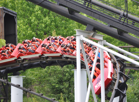 Six Flags St. Louis, in partnership with Samsung Electronics America, opens The New Revolution Virtual Reality (VR) Coaster on Ninja. Sensors on the track sync the movement of the coaster to the video guests are watching on their Samsung Gear VR powered by Oculus while flying through the 2,430 feet of looping steel. This 360°, fully immersive, virtual reality experience is also the first to use game play on a roller coaster by allowing guests to shoot at targets with the headset's touch pad. (Photo: Business Wire)