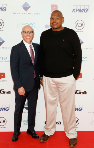 David McCourt chairman and CEO of Granahan McCourt with Hollywood actor Omar Miller at the launch of ALTV (Photo: Business Wire)