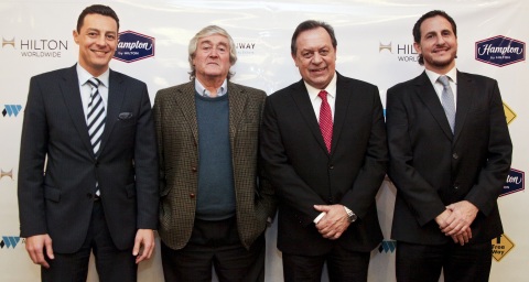 Eduardo Rodriguez Suarez, Dado Carey, Gustavo Santos and Lisandro Cristia attend the Hampton by Hilton Bariloche signing ceremony. (Photo: Business Wire)