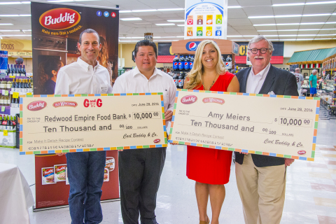 Tom Buddig, executive vice president of marketing at Carl Buddig & Company, presents Amy Meiers, the Grand Prize winner in the Make It Delish Recipe Contest, and David Goodman, CEO of Redwood Empire Food Bank, $10,000 each at a check presentation event held at G&G Supermarket in Santa Rosa, California (From left to right: David Goodman, Teejay Lowe, Amy Meiers, Tom Buddig) (Photo: Business Wire)