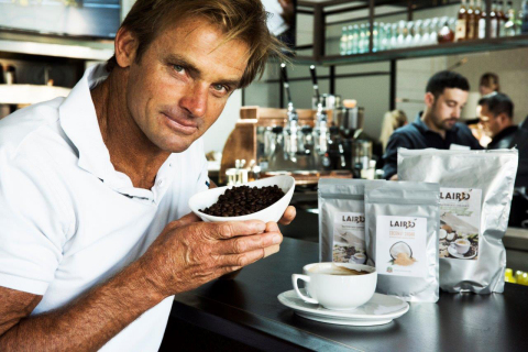 Laird Hamilton inspecting Laird Superfood Coffee Beans at Ollo Restaurant & Bar in Malibu, CA (Photo: Business Wire)