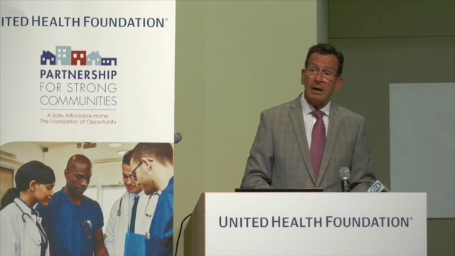 Gov. Malloy speaks during an event where United Health Foundation announced a $300,000 grant to Partnership for Strong Communities to expand the Opening Doors-CT Hospital Initiative, which connects people experiencing homelessness who are frequent users of hospital emergency departments with housing and other services (Video: Wendy Kohn).