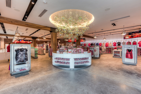 Inside Coca-Cola Store Orlando, guests are welcomed by a 30-foot-wide blown-glass chandelier crafted from repurposed Coca-Cola bottles - just one example of how this unique retail experience was designed with the environment in mind. (Photo: Business Wire)