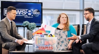 WFAA-TV’s Midday News with host Ron Corning, left, looks on as Bill Durling, VP, Global Communications for Staples, right, presents Jennifer Hatcher, a teacher at W. E. Greiner Exploratory Arts Academy in Dallas, center, with a package of school supplies for her students, courtesy of Staples, during the stations broadcast, Tuesday, July 19, 2016, at WFAA's studios in Dallas, Texas. Durling announced that Staples is funding all teacher projects for Dallas, totaling $185,155, including Mrs. Hatcher’s, currently active on DonorsChoose.org – a charity that has funded more than 700,000 classroom projects and impacted more than 18 million students across the U.S. Continuing its long-standing commitment to support education through its #StaplesforStudents program, Staples teamed up with global superstar Katy Perry earlier this year to announce a $1 million donation to DonorsChoose.org. (Brandon Wade/AP Images for Staples)