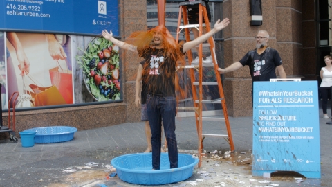A Klick People Experience manager gets doused in 3 gallons of ketchup outside the company's headquarters in Toronto to help kick-off the #WhatsInYourBucket Challenge for ALS, a fun, new spin-off of the Ice Bucket Challenge. To help raise more funds for ALS Research, Klick will post a new #WhatsInYourBucket video each workday in August on social media. (Photo: Business Wire)
