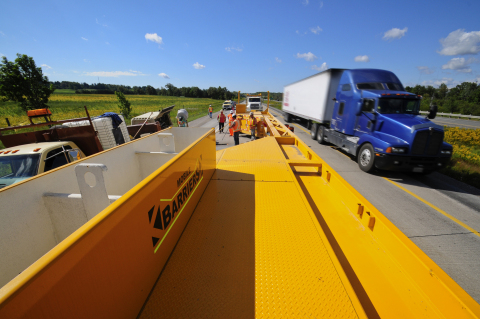 Mobile Barriers MBT-1, a highly mobile barrier, protects workers and increases efficiency in short term work zones. (Photo: Business Wire)