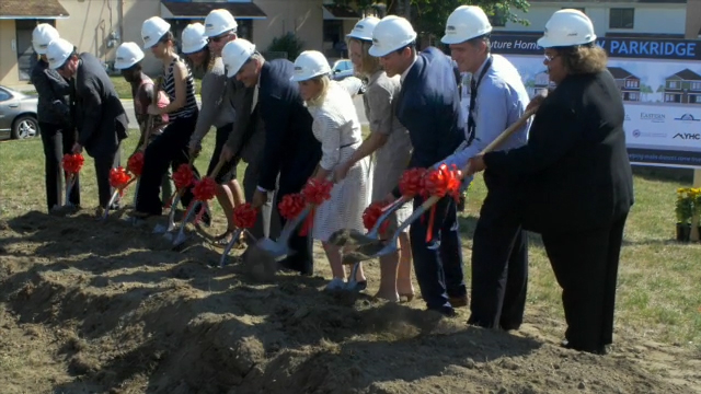 B-Roll of ceremonial shovel groundbreaking, demolition of old buildings and audience reaction and cheers to celebrate (Video: Lucas Christenson).