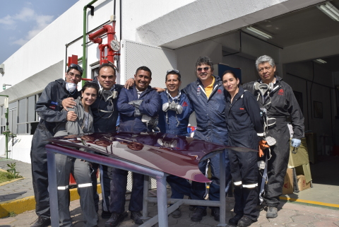 Employees at Axalta's operations center in Tlalnepantla, Mexico, among the many people of Axalta aro ... 