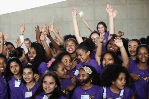 Beneficiaries of 'One Win Leads to Another' celebrate during Saturday's event in Rio de Janeiro. (Photo: Business Wire)