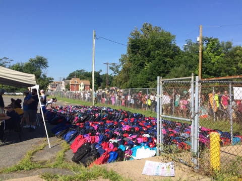 Families wait in line in Chester, Pennsylvania at City Team's Backpack Day to receive backpacks fill ... 