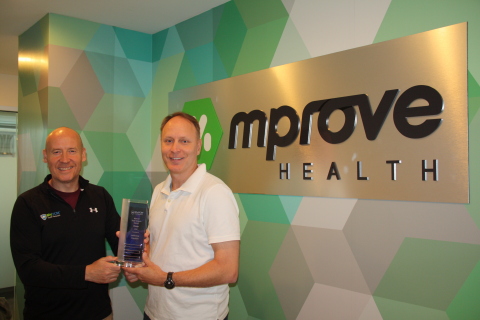 Ostendio CEO, Grant Elliott, and Jeff Lee, CEO at mProve Health (Photo: Business Wire)