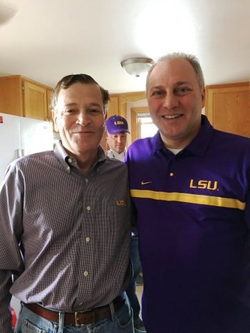 Majority Whip Steve Scalise and Abode Properties CEO Daniel Moos cheer on their LSU Tigers. (Photo: Business Wire)